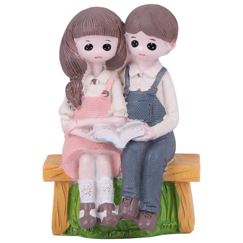 Couple Figurine on Bench